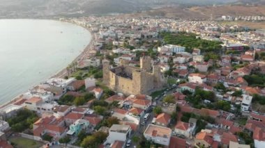 Aerial view of the historical candarli castle in the evening sun. High quality 4k footage