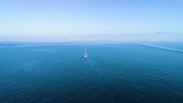 Aerial tracking of the sailing boat sailing to the Aegean Sea with drone. High quality 4k footage