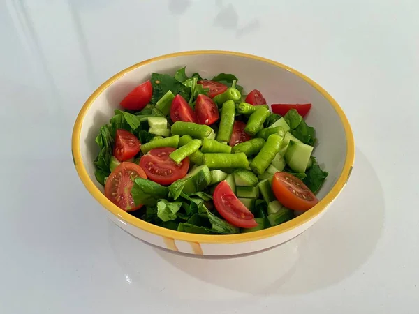 stock image The famous Aegean salad of Turkish cuisine, consisting of tomatoes, arugula, cucumbers and peppers. High quality photo