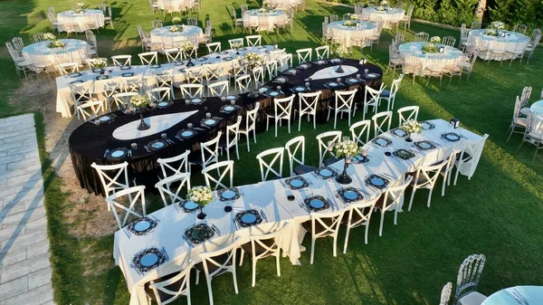 aerial view of tables and chairs in country wedding hall. High quality photo