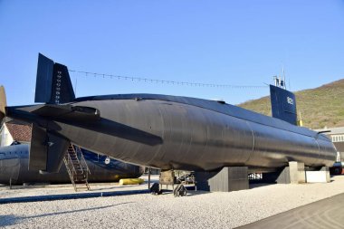 Tivat,Montenegro,March 5,2020. Submarines at The Maritime Heritage Museum in Tivat. Blue sky behind.