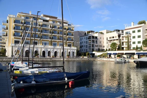 Tivat, Montenegro, March 6, 2020. Yachts and boats in the harbour. Hotels behind. 