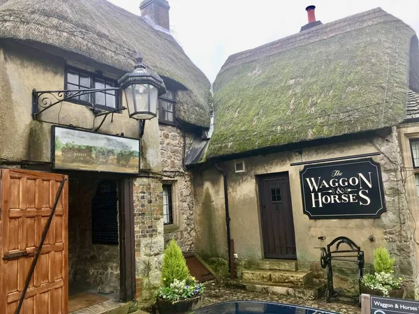 The Waggon and Horses Pub, 16th Century Public house with thatched roof.   Marlborough, Wiltshire, UK, February 20, 2020. 