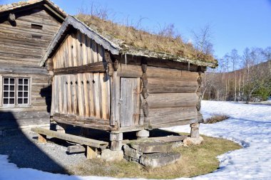 Historical Wooden Log Farm Buildings. Bygland, Norway, February 21, 2023. 