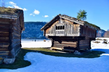 Historical Wooden Log Farm Buildings. Bygland, Norway, February 21, 2023. 