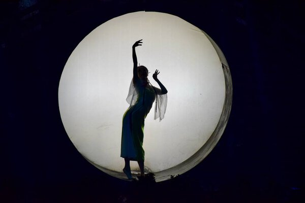 Performer in Silhouette at The Song Dynasty Show. Hangzhou, Zhejiang, China. October 28, 2018. 