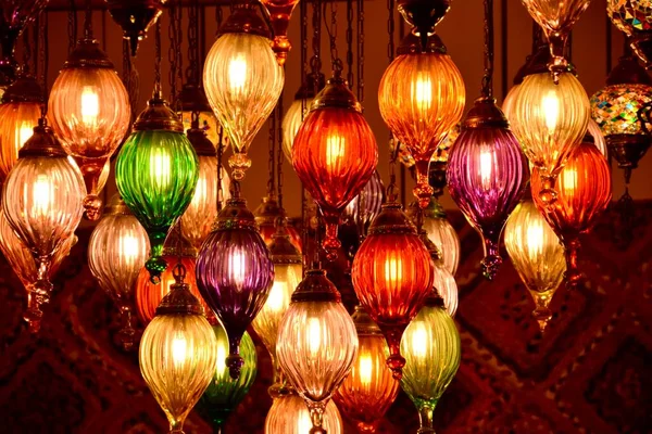Multi Coloured indoor Lights hanging in a cluster.