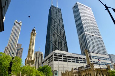 The John Hancock Center and The Water Tower. Chicago, IL, USA. June 3, 2014.  clipart