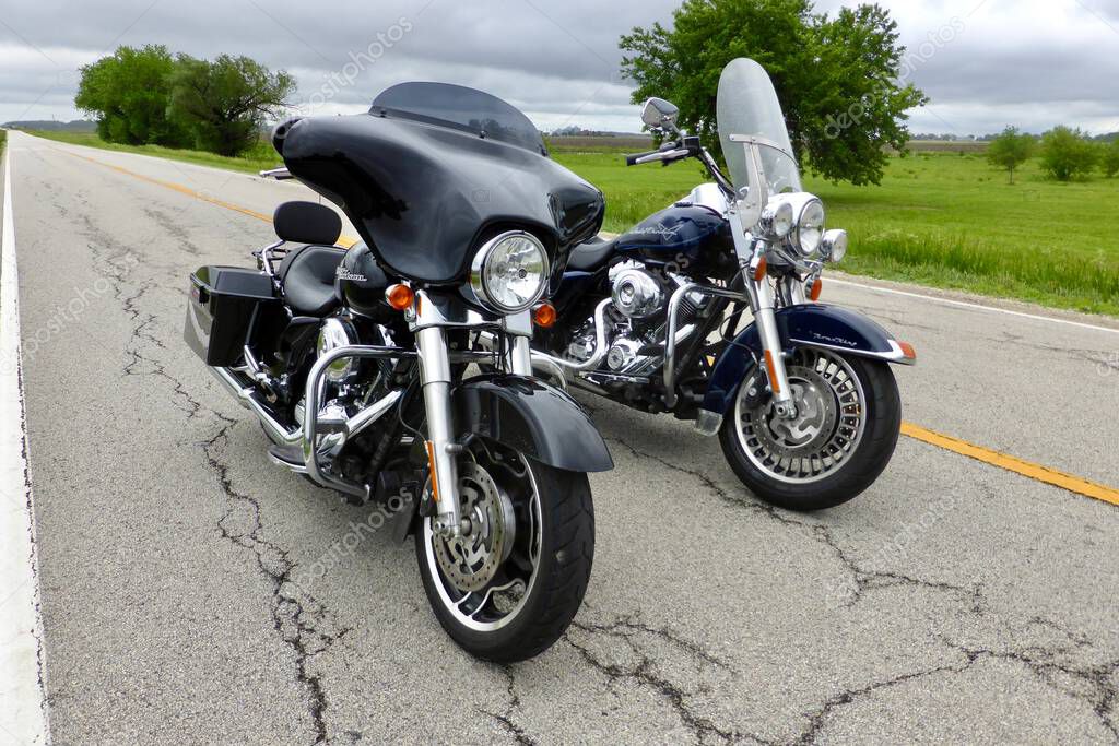 Two Harley Davisdon Motorcycles on the road in Illinois. Illinois, USA. June 4, 2014.