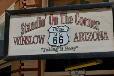 Taking It Easy Route 66 Sign. Winslow, Arizona, USA. June 12, 2014 clipart