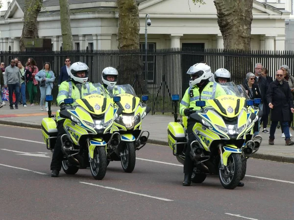 stock image Metropolitan Police Motorcyclists on Birdcage Walk two days before the Coronation of Kings Charles III. Close to Buckingham Palace. London, UK. May 4,2023.