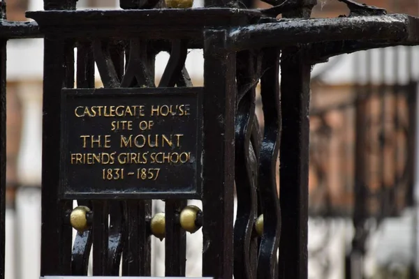 Stock image Sign for Castlegate House, built in 1763. A Georgian Grade I listed building. York, UK. May 24, 2023. 