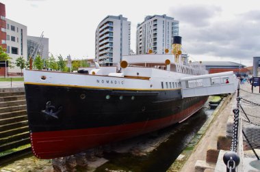 Belfast, UK. August 19, 2013. SS Nomadic, a former tender of the White Star Line, built in 1911. Now at Titanic, Belfast.  clipart