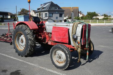 Vintage Silver Someca Tractor with boat trailer on Asnelles Beach. Asnelles, France, July 6, 2023. 
