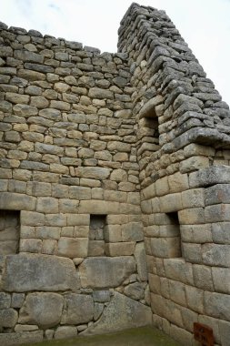 Antik 15. yüzyıl İnka kalesindeki Taş Binalar 'ın detayları. Machu Picchu, Peru, 6 Ekim 2023. 