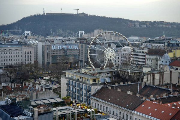 View of Budapest and The Big Wheel from the roof of St Stephens Basilica. Budapest, Hungary, February 27, 2024. 