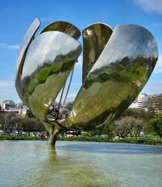 Floralis Genrica, a sculpture made of steel and aluminum in Plaza de las Naciones Unidas, Avenida Figueroa Alcorta. Buenos Aires, Argentina, October 22, 2023.  clipart