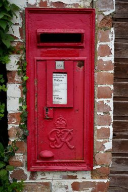 Vintage Red British post box from the reign of King George VI (1936-1952), Goulceby, Louth, UK. April 12, 2024.  clipart