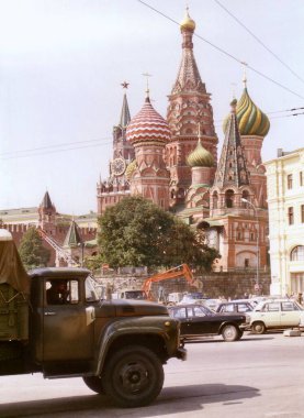 Soviet era image of St Basils Cathedral behind a vintage Russian lorry on Red Square, Moscow, Russia, September 1, 1989.  clipart
