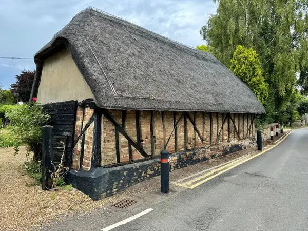 Stock image Traditional half timbered thatched building. Houghton, Huntingdon, England, UK. July 24, 2024. 