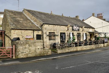 Calico Jack Restaurant ,originally erected in the early 1800s  as a school for young factory workers. Skipton, North Yorkshire, England, UK. November 2024.  clipart