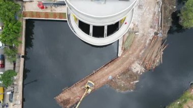 construction of a polder pump system building that connects the river and the sea