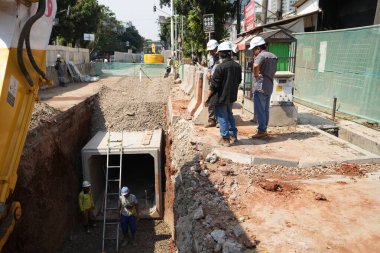 Malezya 'da inşaat alanında çalışan işçiler