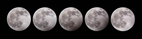 5 Different phases of a partial lunar eclipse. The shadow of earth passing over the surface of the moon. Black background. High quality photo