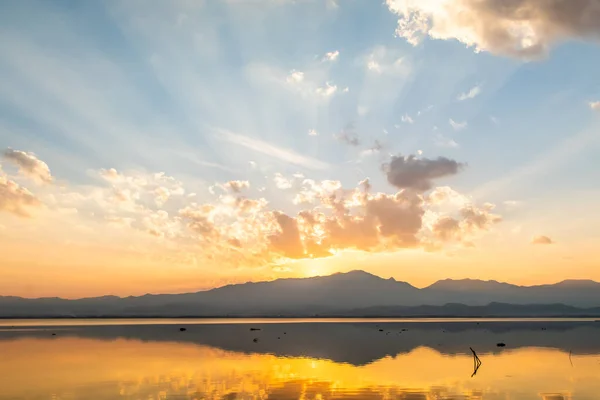 stock image Sunset over lake Phayao with reflection and bright colourful sky. . High quality photo