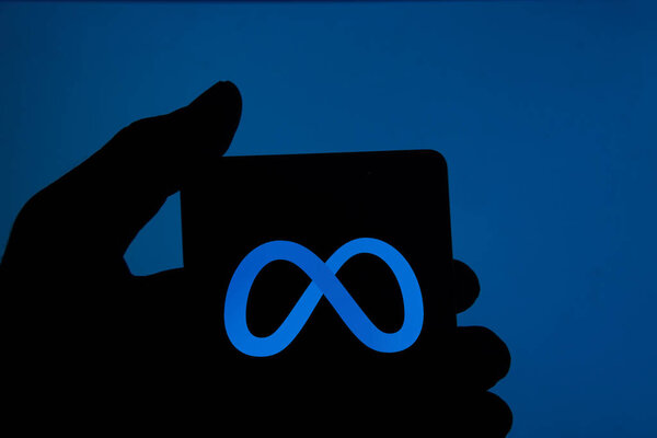 Dhaka, Bangladesh - 24 November 2023: Meta logo seen displayed on a smartphone.