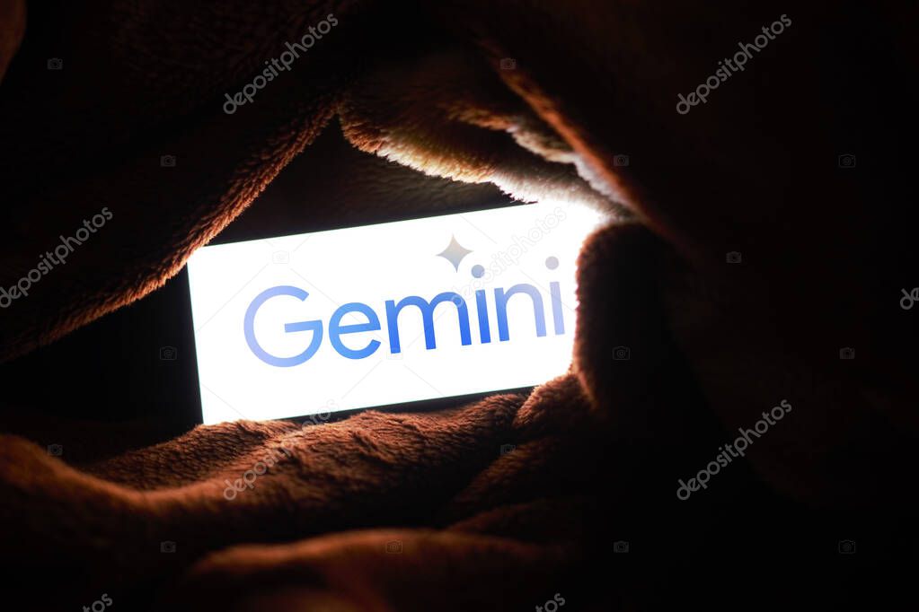 Dhaka, Bangladesh - 09 December 2023: Google Gemini logo on a smartphone screen. The tool was launched by Google as its new multimodal artificial intelligence (AI) model.