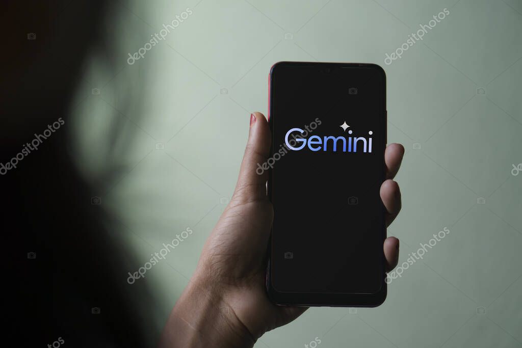 Dhaka, Bangladesh - 09 December 2023: Google Gemini logo on a smartphone screen. The tool was launched by Google as its new multimodal artificial intelligence (AI) model.