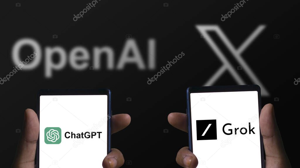 Dhaka, Bangladesh - 16 December 2023: Hand holding a phone with OpenAI ChatGPT AI chatbot and X.com Gork AI chatbot.