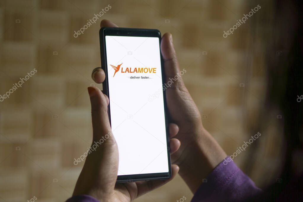 Dhaka, Bangkadesh- 17 February 2024: Lalamove logo is displayed on smartphone.