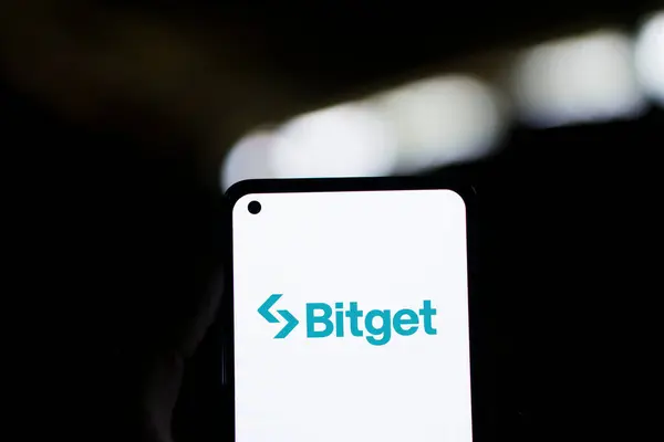 stock image Dhaka, Bangladesh- 11 March 2024: Bitget logo is displayed on smartphone.