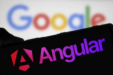 Dhaka, Bangladesh- 09 Apr 2024: Angular logo is displayed on smartphone. Developed by Google, Angular is a free, open-source framework for building dynamic web applications using TypeScript. clipart