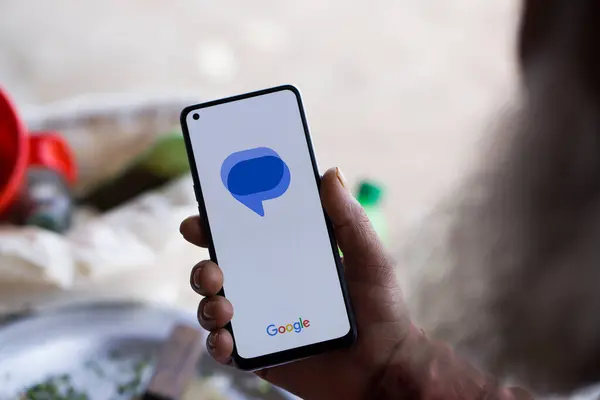 stock image Dhaka, Bangladesh- 13 Apr 2024: Google messages logo is displayed on smartphone.