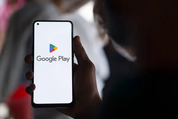 stock image Dhaka, Bangladesh- 28 may 2024: Google play store logo is displayed on smartphone.