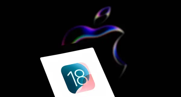 stock image Dhaka, Bangladesh- 14 June 2024: Apple IOS 18 logo is displayed on smartphone.