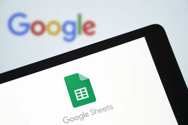 stock image Dhaka,Bangladesh - 08July2024: Google Sheets logo is displayed on smartphone.