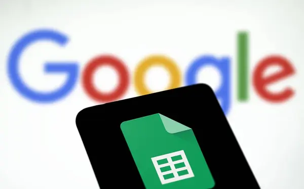 stock image Dhaka,Bangladesh - 08July2024: Google Sheets logo is displayed on smartphone.