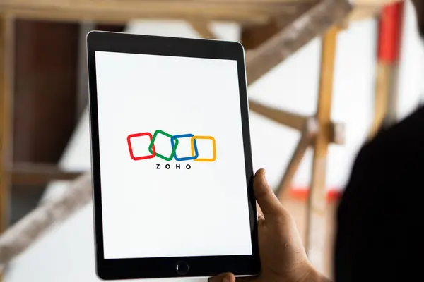 stock image Dhaka, Bangladesh- 16 July 2024: Zoho logo is displayed on iPad.