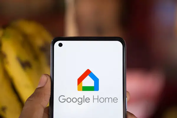 Stock image Dhaka, Bangladesh- 23 July 2024: Google Home logo is displayed on smartphone.