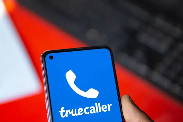 stock image Dhaka, Bangladesh- 25 July 2024: Truecaller logo is displayed on smartphone. Truecaller is a smartphone application that has features of caller ID, call-blocking, flash-messaging, call-recording chat and voice by using the Internet.