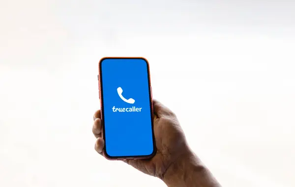 stock image Dhaka, Bangladesh- 25 July 2024: Truecaller logo is displayed on smartphone. Truecaller is a smartphone application that has features of caller ID, call-blocking, flash-messaging, call-recording chat and voice by using the Internet.