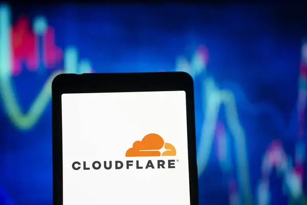 stock image Dhaka, Bangladesh- 05 Aug 2024: CloudFlare logo is displayed on smartphone. Cloudflare is a US-based tech firm offering website security, performance, and reliability services.