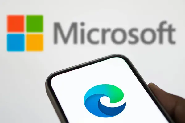 stock image Dhaka, Bangladesh- 07 Aug 2024: Microsoft Edge logo is displayed on smartphone. Microsoft Edge (or simply nicknamed Edge) is a proprietary cross-platform web browser created by Microsoft.