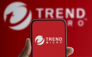 Dhaka, Bangladesh- 09 Aug 2024: Trend Micro Inc. logo is displayed on smartphone. Trend Micro Inc.is an American Japanesecyber securitysoftware company. clipart