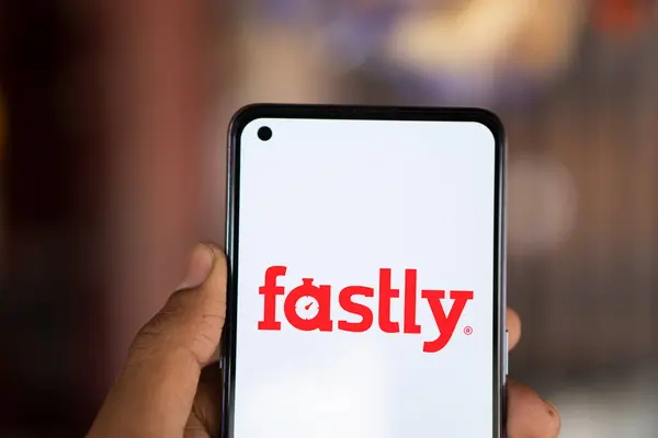 stock image Dhaka, Bangladesh- 19 Aug 2024: Fastly Inc logo is displayed on smartphone. Fastly, Inc is an American cloud computing services provider.