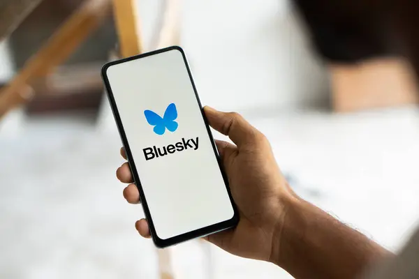 stock image Dhaka, Bangladesh- 05 Aug 2024: Bluesky logo is displayed on smartphone. Bluesky is a  microblogging social platform.